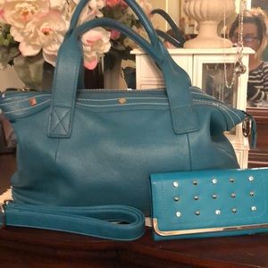 Nice Turquoise bag and wallet.